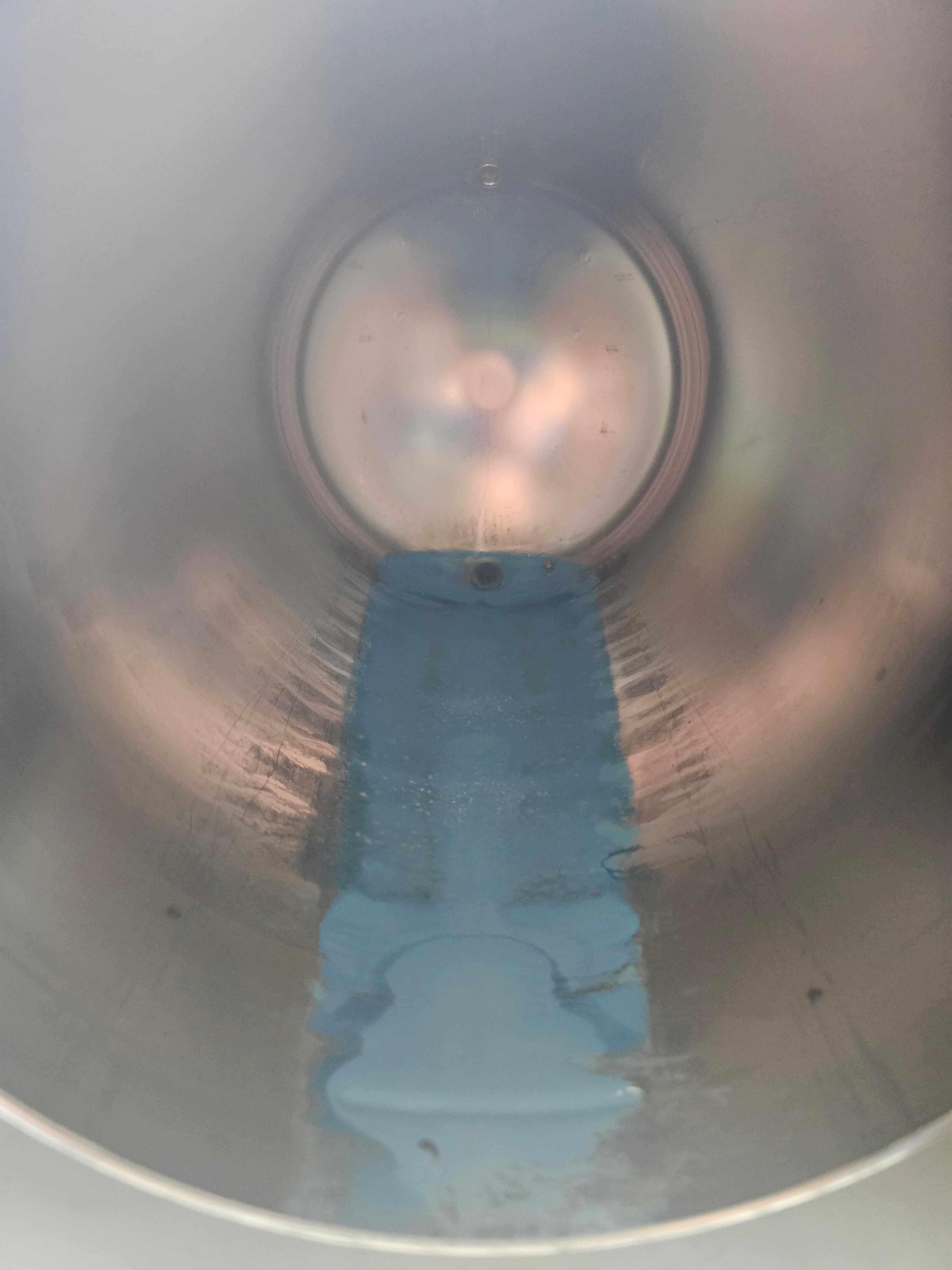 Tuttnauer 2350 chamber before cleaning — mineral deposits and discoloration